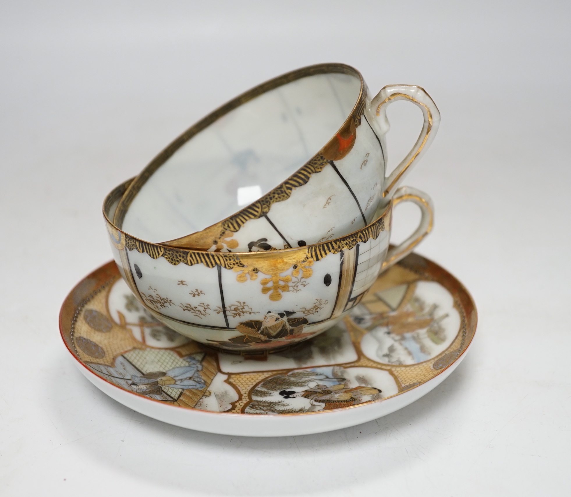 A group of Japanese ceramics, Meiji period and later including satsuma saucers and Imari cup and saucer, largest 17cm in diameter